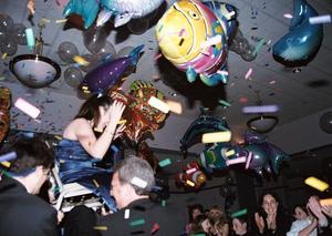 Melissa aloft with confetti