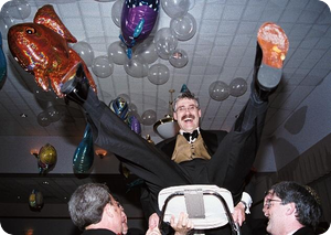 Flying Chairs and Flying Fish Dick up in a chair