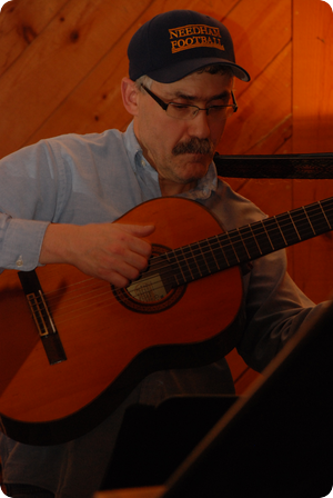 Dick with a Borrowed Guitar